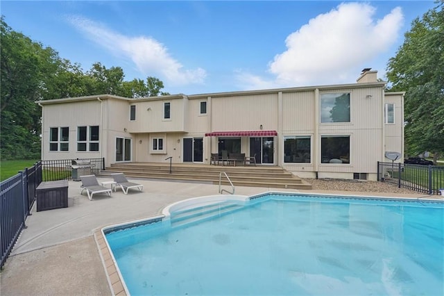 14927 S Caenen Ln, Olathe, KS 66062 - rear view of property with a patio and a chimney