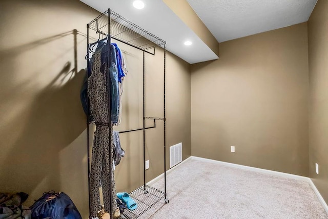 9008 N Hunter Ave, Kansas City, MO 64157 - interior space featuring carpet, baseboards, and recessed lighting