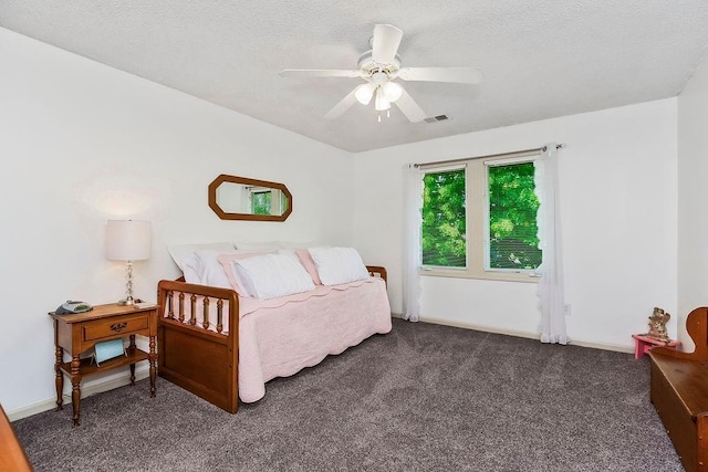 9008 N Hunter Ave, Kansas City, MO 64157 - bedroom with carpet flooring, a textured ceiling, baseboards, and ceiling fan
