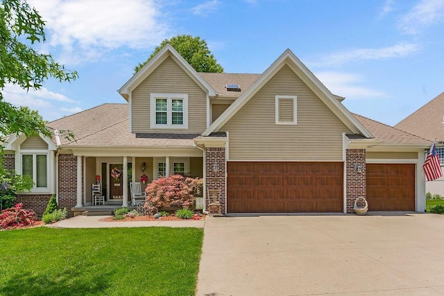9008 N Hunter Ave, Kansas City, MO 64157 - traditional home featuring a porch, brick siding, concrete driveway, an attached garage, and a front lawn