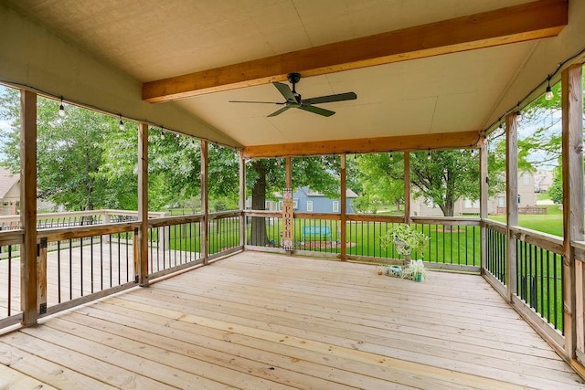 9008 N Hunter Ave, Kansas City, MO 64157 - wooden terrace with ceiling fan and a lawn