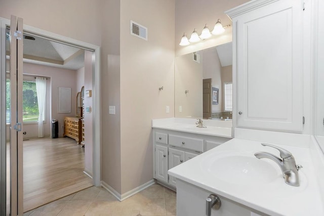 9008 N Hunter Ave, Kansas City, MO 64157 - bathroom with double vanity and tile patterned floors