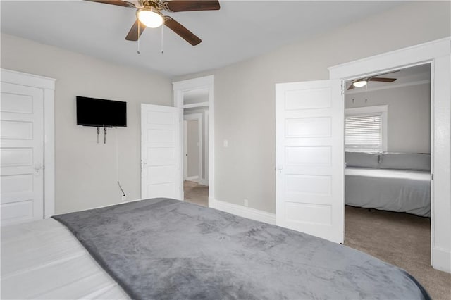 915 E 29th St, Kansas City, MO 64109 - carpeted bedroom with ceiling fan