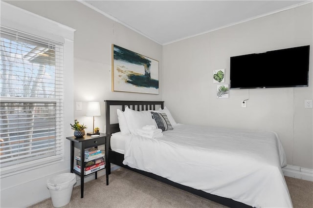 915 E 29th St, Kansas City, MO 64109 - carpeted bedroom featuring ornamental molding