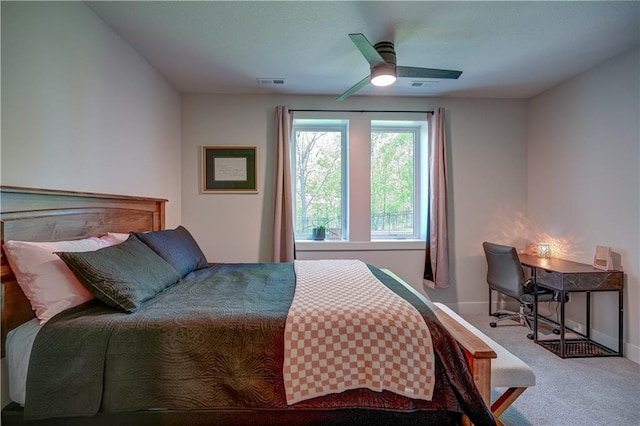 bedroom featuring carpet floors, a ceiling fan, and baseboards