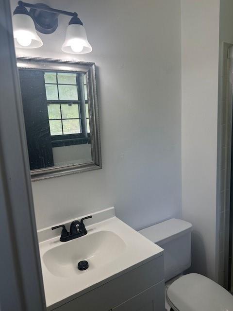 7037 N Holmes St, Gladstone, MO 64118 - full bathroom featuring toilet and vanity