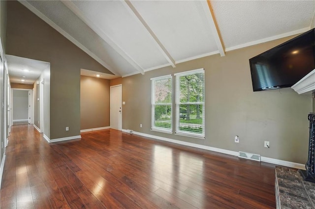 unfurnished living room featuring beamed ceiling, wood finished floors, baseboards, and high vaulted ceiling