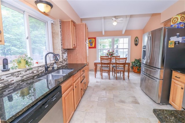 2218 Condolea Ter, Leawood, KS 66209 - kitchen featuring stainless steel appliances, a sink, backsplash, stone tile flooring, and a ceiling fan
