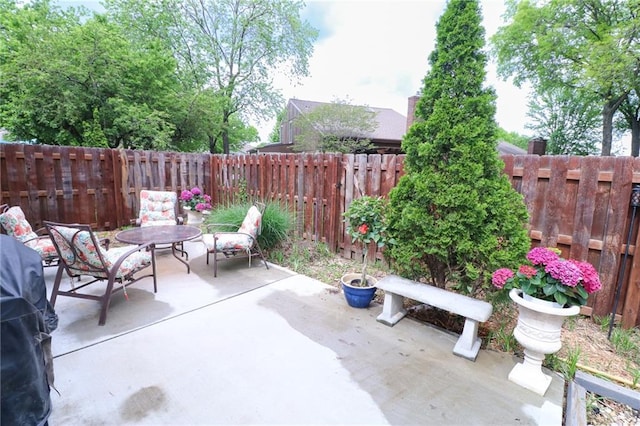 2218 Condolea Ter, Leawood, KS 66209 - view of patio / terrace with a fenced backyard and outdoor dining area