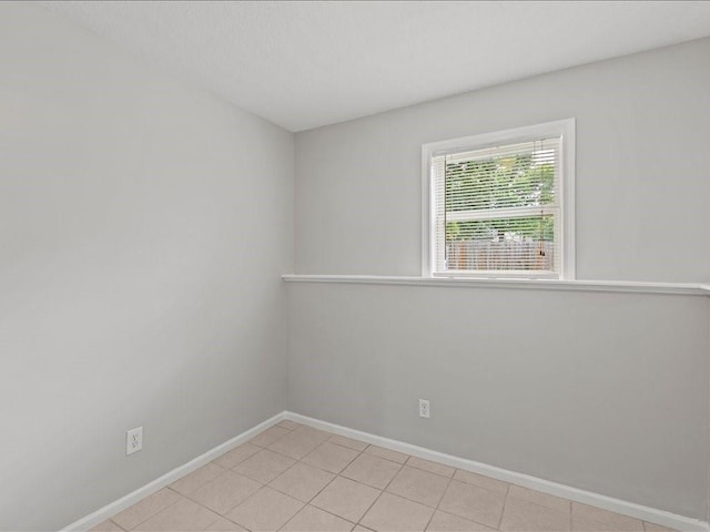 310-312 N 8th St, Leavenworth, KS 66048 - spare room featuring baseboards