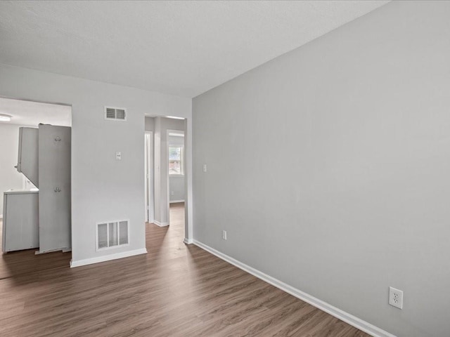 310-312 N 8th St, Leavenworth, KS 66048 - empty room with baseboards and wood finished floors
