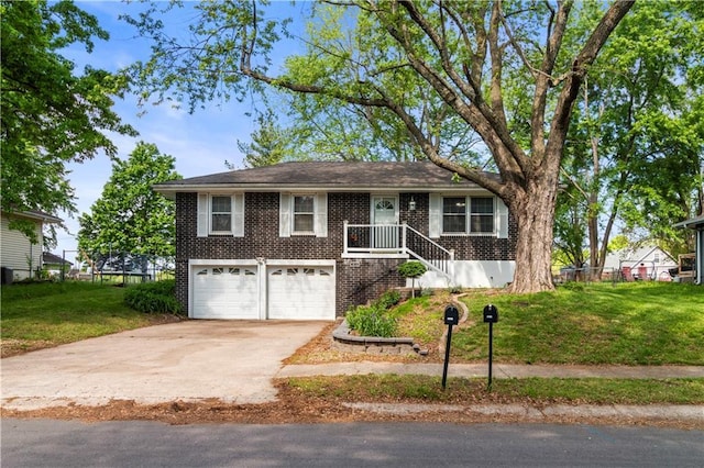 1608 SE Hillside Dr, Oak Grove, MO 64075 - ranch-style home with brick siding, concrete driveway, and a garage