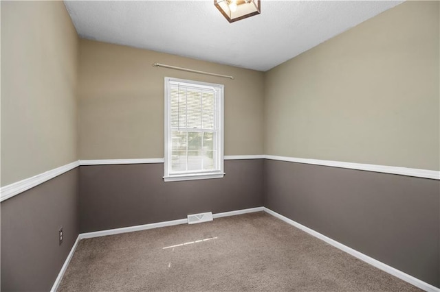 1608 SE Hillside Dr, Oak Grove, MO 64075 - spare room with baseboards and carpet flooring