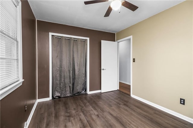 1608 SE Hillside Dr, Oak Grove, MO 64075 - unfurnished bedroom featuring wood finished floors, baseboards, a ceiling fan, and a closet