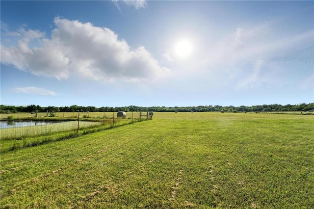39460 Indianapolis Rd, Lane, KS 66042 - view of grassy yard with a rural view and a water view