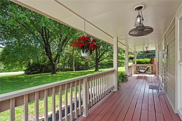 21815 W 73rd Ter, Shawnee, KS 66218 - porch featuring a ceiling fan and a yard