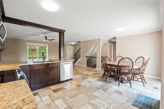 21815 W 73rd Ter, Shawnee, KS 66218 - kitchen with stainless steel dishwasher, dark brown cabinets, stone tile floors, ceiling fan, and ornamental molding