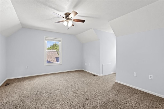21815 W 73rd Ter, Shawnee, KS 66218 - bonus room featuring carpet, lofted ceiling, ceiling fan, baseboards, and a textured ceiling