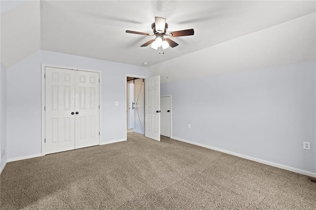 21815 W 73rd Ter, Shawnee, KS 66218 - unfurnished bedroom with carpet floors, lofted ceiling, baseboards, a closet, and ceiling fan