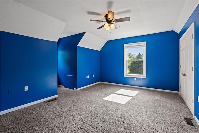 21815 W 73rd Ter, Shawnee, KS 66218 - additional living space with lofted ceiling, carpet, ceiling fan, and baseboards