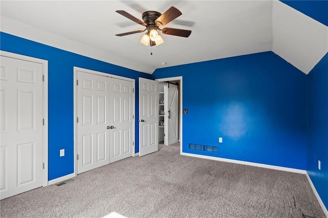 21815 W 73rd Ter, Shawnee, KS 66218 - unfurnished bedroom with carpet floors, baseboards, a closet, ceiling fan, and lofted ceiling