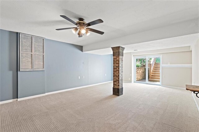 21815 W 73rd Ter, Shawnee, KS 66218 - empty room featuring decorative columns, baseboards, carpet, and ceiling fan