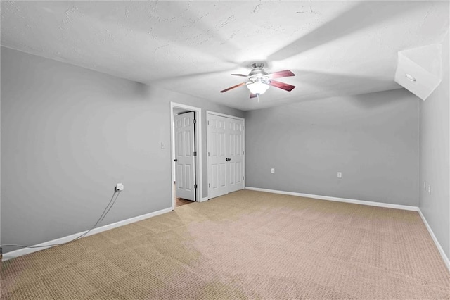 21815 W 73rd Ter, Shawnee, KS 66218 - unfurnished bedroom with carpet floors, baseboards, and a ceiling fan