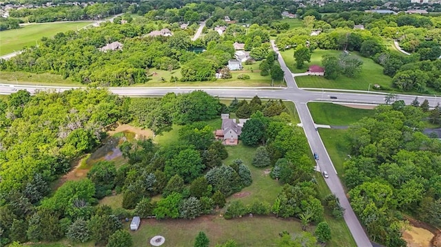 21815 W 73rd Ter, Shawnee, KS 66218 - aerial view of property's location featuring a tree filled landscape