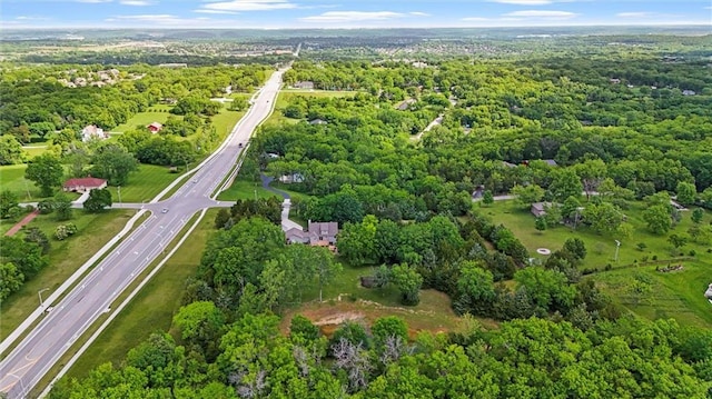 21815 W 73rd Ter, Shawnee, KS 66218 - view of property location featuring a main thoroughfare and a heavily wooded area