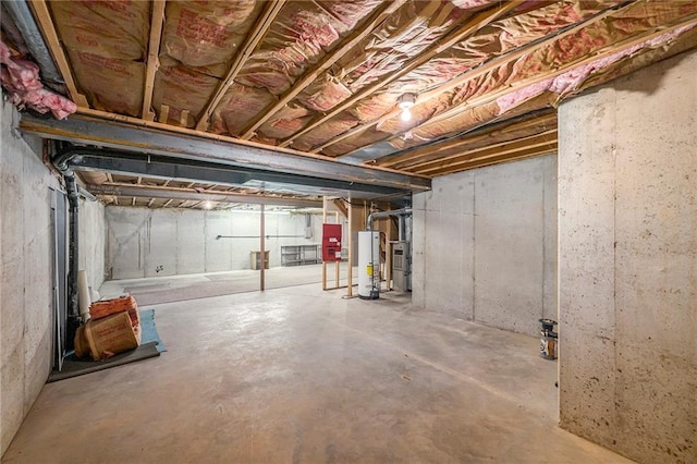 unfinished below grade area with gas water heater