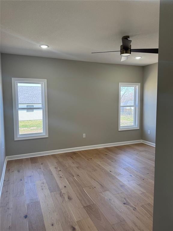 305 N Prairie St, Hamilton, MO 64644 - empty room featuring baseboards, wood finished floors, a ceiling fan, and recessed lighting