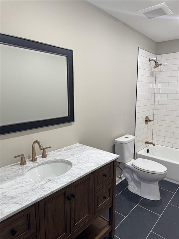305 N Prairie St, Hamilton, MO 64644 - full bathroom featuring toilet, vanity, tile patterned flooring, and bathing tub / shower combination