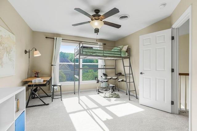7711 N Montgall Ave, Kansas City, MO 64119 - bedroom with carpet floors, baseboards, and ceiling fan