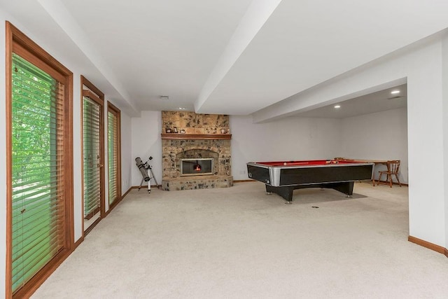 7711 N Montgall Ave, Kansas City, MO 64119 - recreation room with carpet floors, billiards, a fireplace, and baseboards