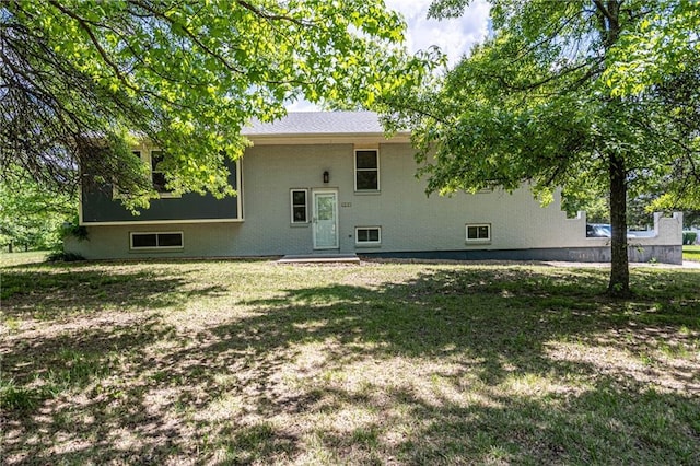 537 NE State Route 13th Hwy, Warrensburg, MO 64093 - back of house with a yard