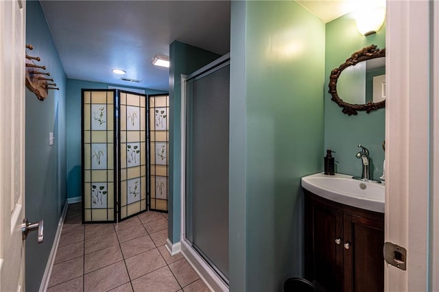 537 NE State Route 13th Hwy, Warrensburg, MO 64093 - full bathroom featuring a stall shower, tile patterned floors, baseboards, and vanity