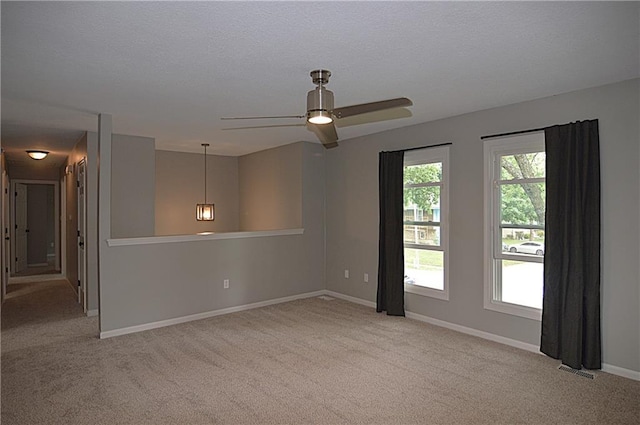 1748 NE Ridgeview Dr, Lees Summit, MO 64086 - carpeted empty room with baseboards and ceiling fan