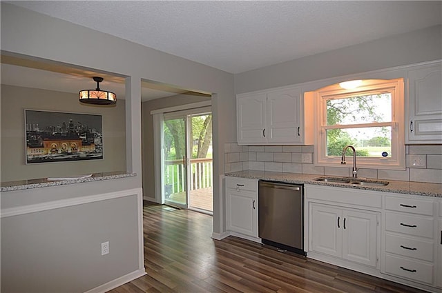 1748 NE Ridgeview Dr, Lees Summit, MO 64086 - kitchen featuring dishwasher, a sink, light stone countertops, and white cabinetry