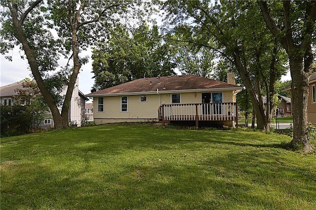1748 NE Ridgeview Dr, Lees Summit, MO 64086 - back of house with a chimney, a yard, and a deck