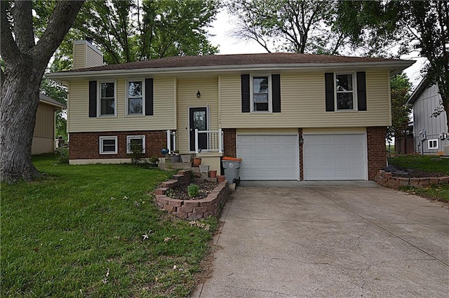 1748 NE Ridgeview Dr, Lees Summit, MO 64086 - raised ranch with brick siding, an attached garage, driveway, a chimney, and a front yard