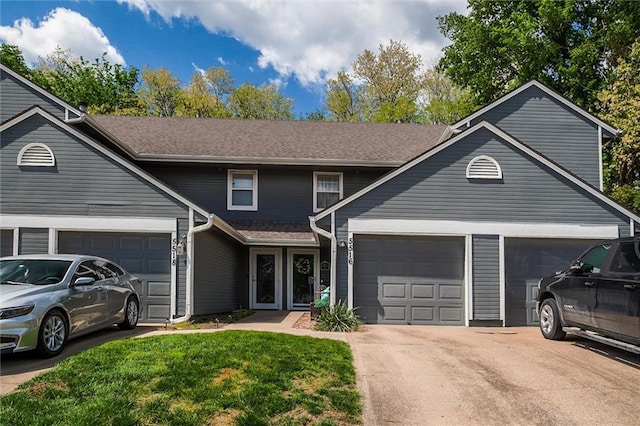 5516 66th Ter, Kansas City, MO 64151 - traditional-style house with an attached garage, driveway, and a front lawn