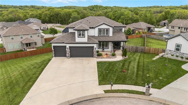 view of front facade featuring driveway, a porch, a garage, a view of trees, and roof with shingles