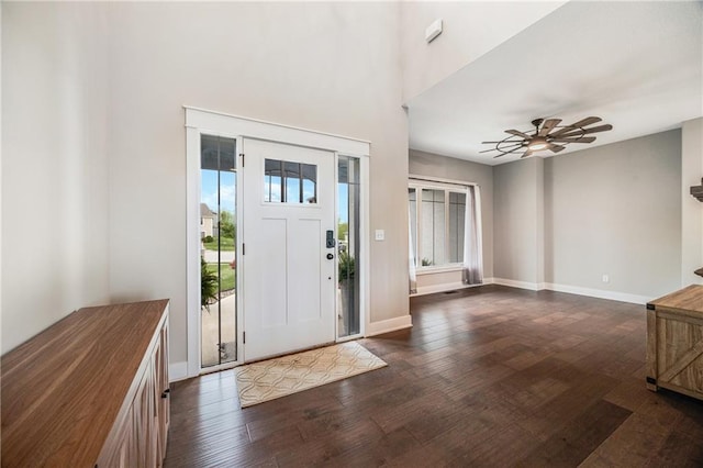 809 N Maple Ct, Lone Jack, MO 64070 - entryway with wood finished floors, ceiling fan, and a high ceiling