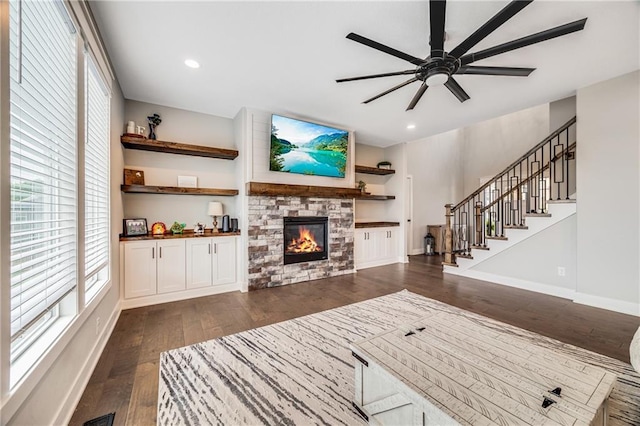 809 N Maple Ct, Lone Jack, MO 64070 - living area with healthy amount of natural light, dark wood finished floors, ceiling fan, stairway, and recessed lighting