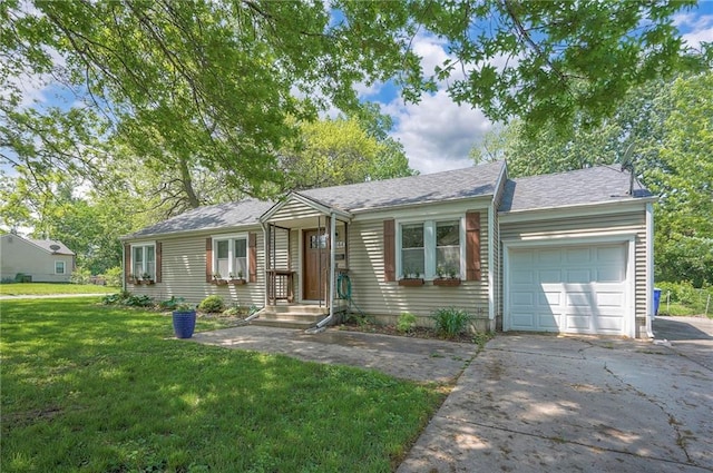 ranch-style home with a garage, a front yard, concrete driveway, and a shingled roof