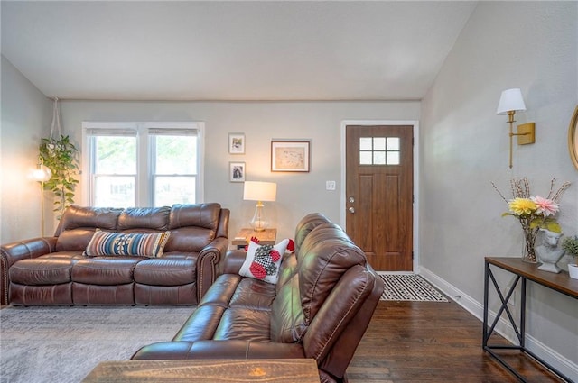 living area featuring wood finished floors and baseboards