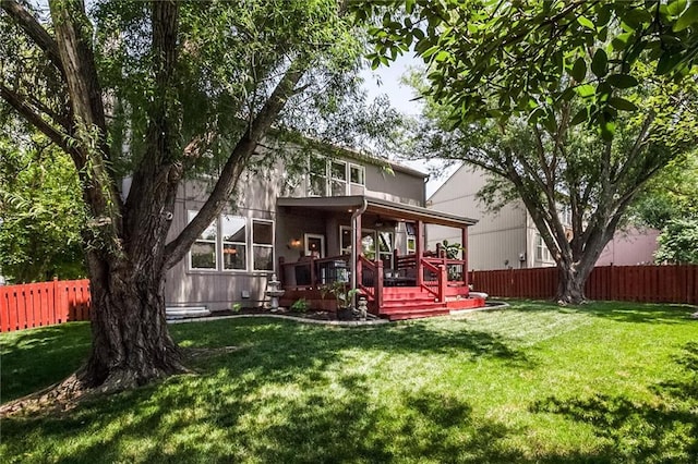1849 W Cedar St, Olathe, KS 66061 - rear view of house featuring a fenced backyard and a wooden deck