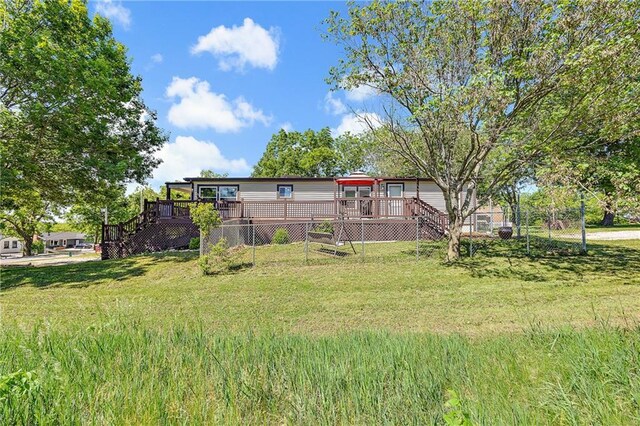 33 Lakeview Ln, Linn Valley, KS 66040 - view of grassy yard with stairway and a deck