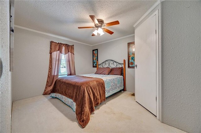 33 Lakeview Ln, Linn Valley, KS 66040 - carpeted bedroom with a textured wall, crown molding, a ceiling fan, and a textured ceiling