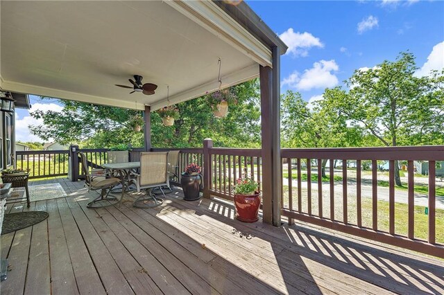 33 Lakeview Ln, Linn Valley, KS 66040 - wooden deck with a ceiling fan and outdoor dining space
